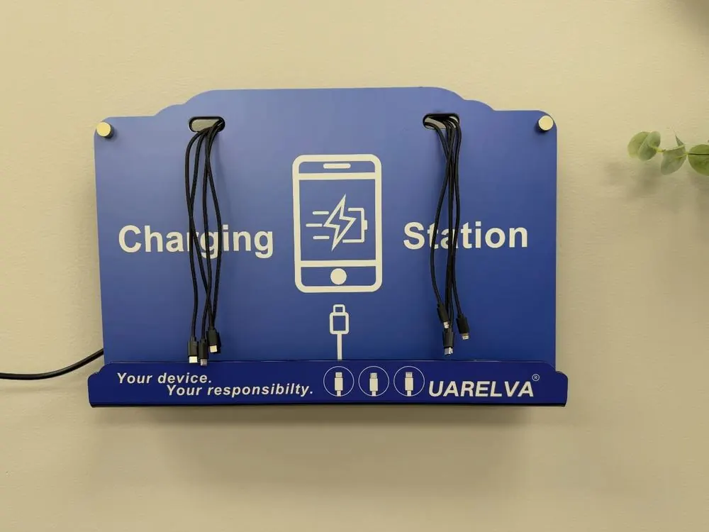 Wall-mounted phone charging station with cables for every device