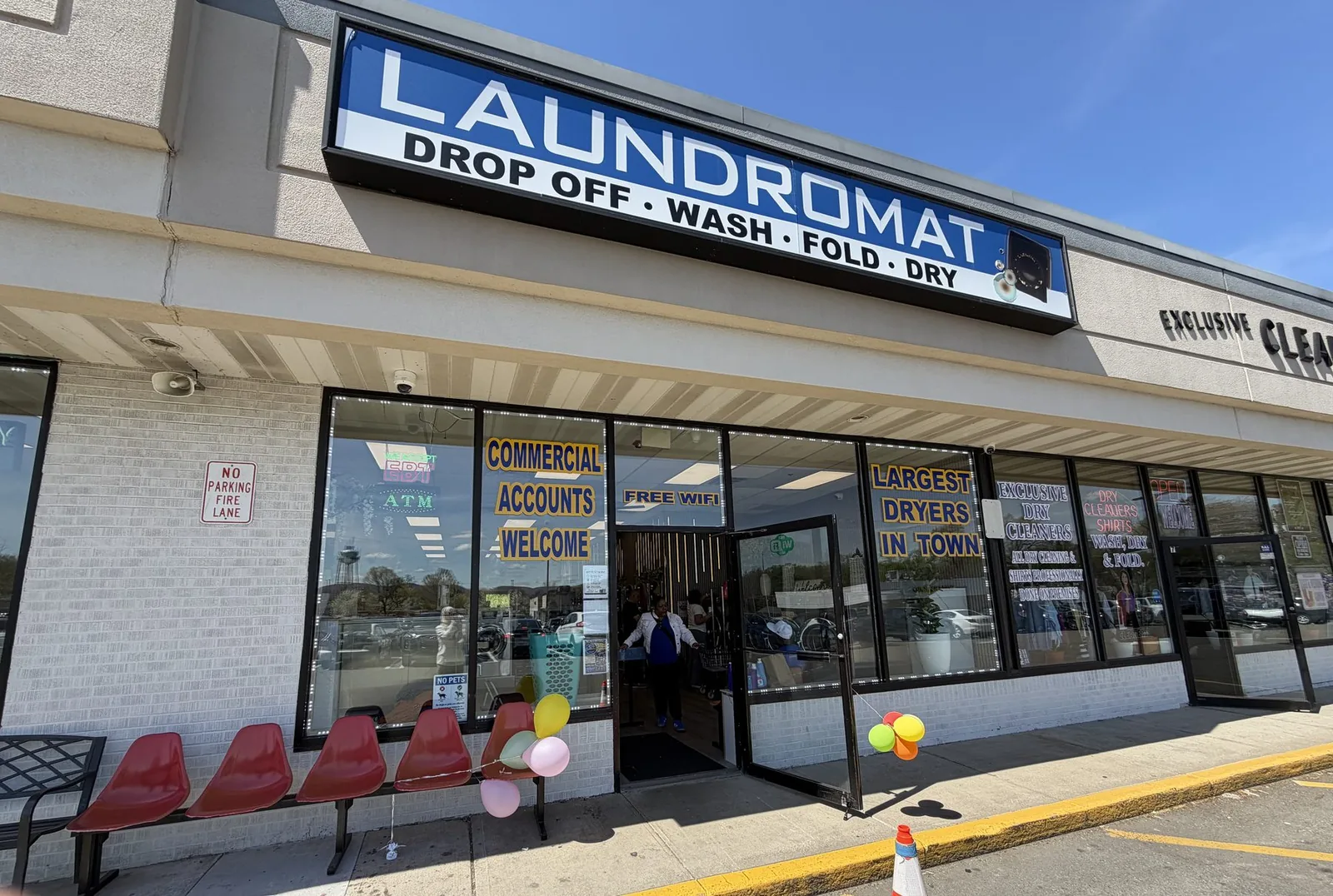 Exterior of Newburgh Express Laundry at 47 North Plank Road, Newburgh NY, next to Market 32 Supermarket